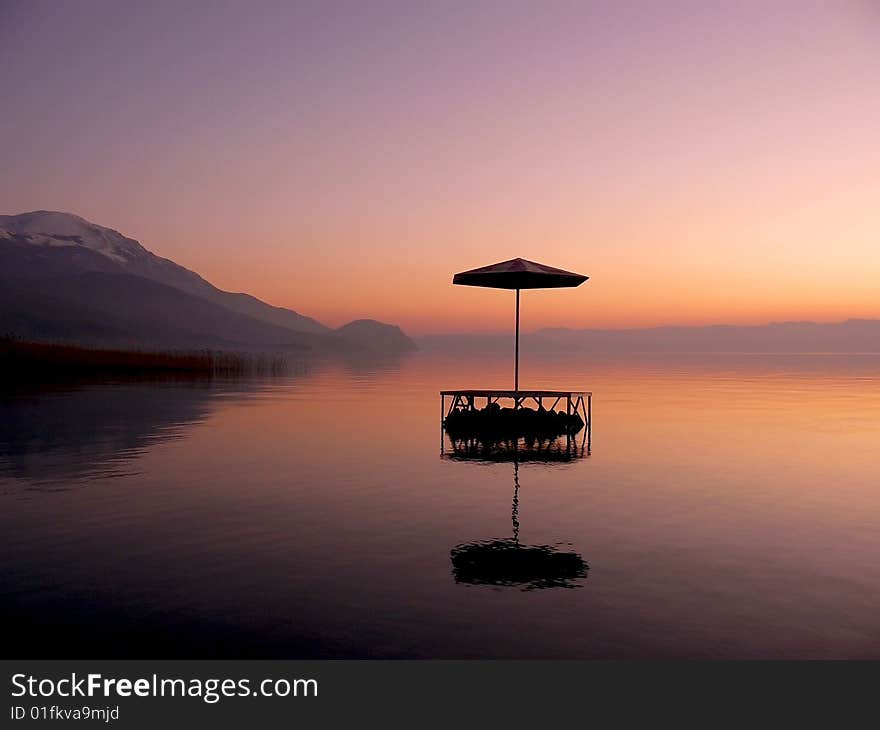 Sunshade islet , sunset, and nice water reflection. Sunshade islet , sunset, and nice water reflection.