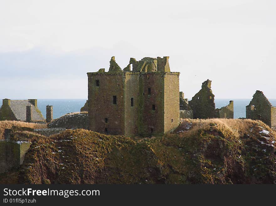 Dunnottar Castle with snow on the ground, Scotland. Dunnottar Castle with snow on the ground, Scotland