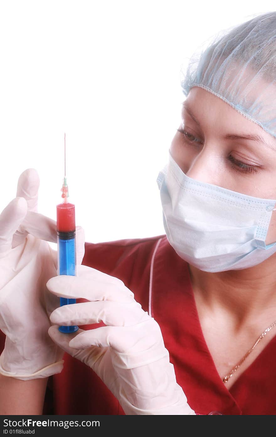 Doctor with a syringe, isolated on a white background. Doctor with a syringe, isolated on a white background