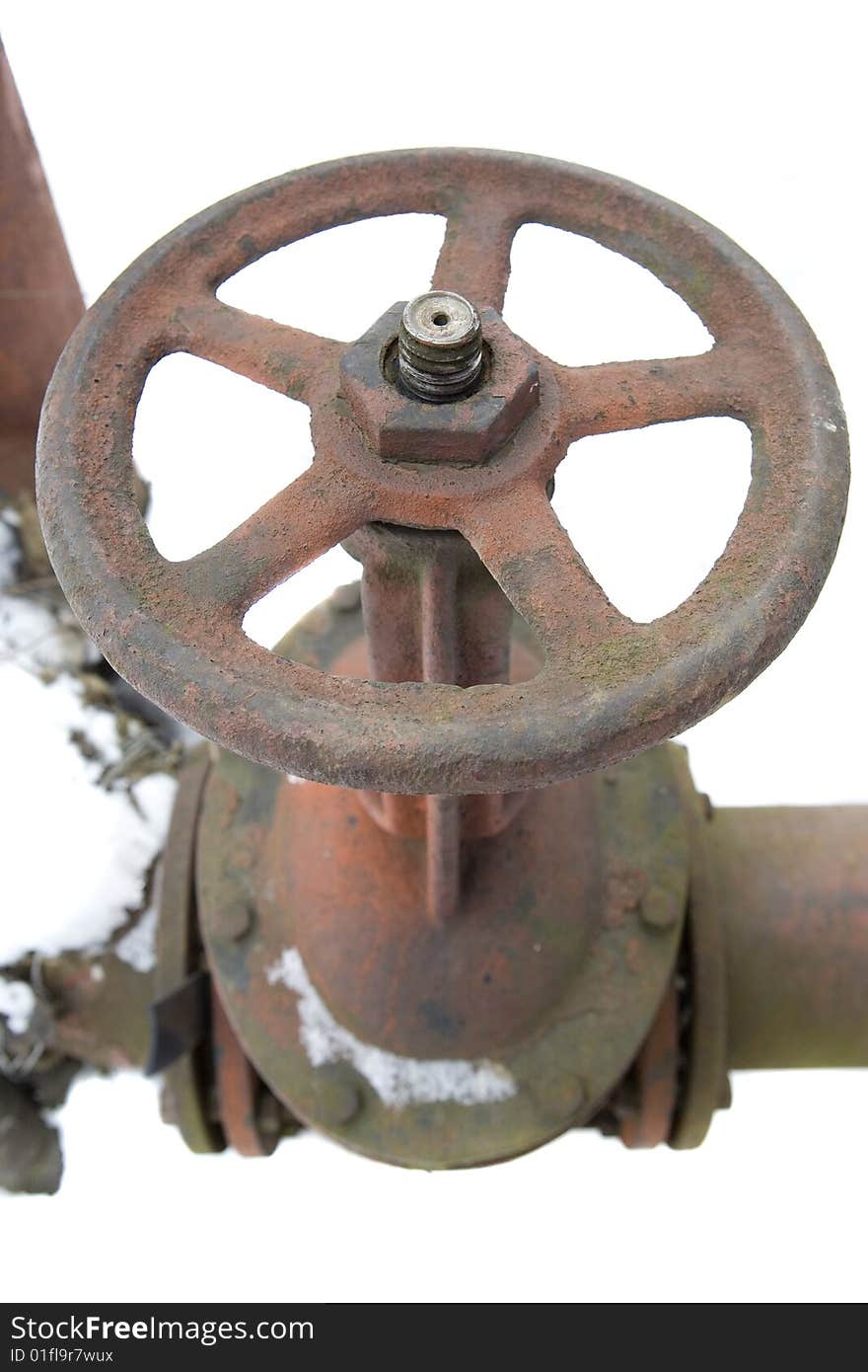 Old rusted hydrant on white ground