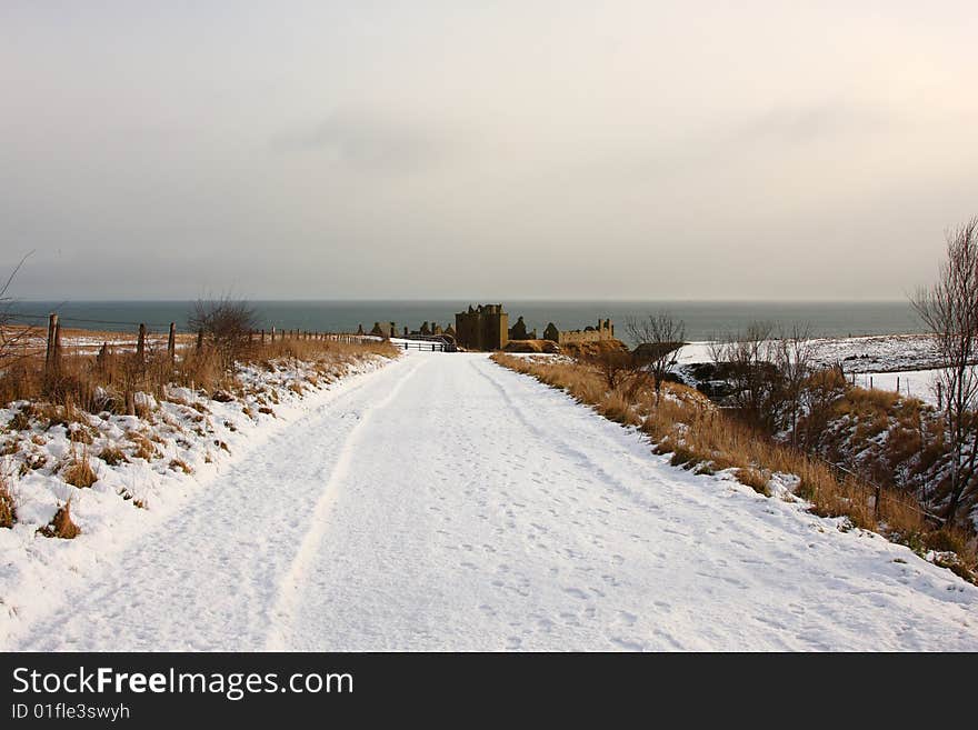 Dunnottar Castle with snow on the ground, Scotland. Dunnottar Castle with snow on the ground, Scotland