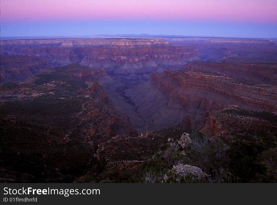 The line of day chases the away the night over western Grand Canyon. The line of day chases the away the night over western Grand Canyon.