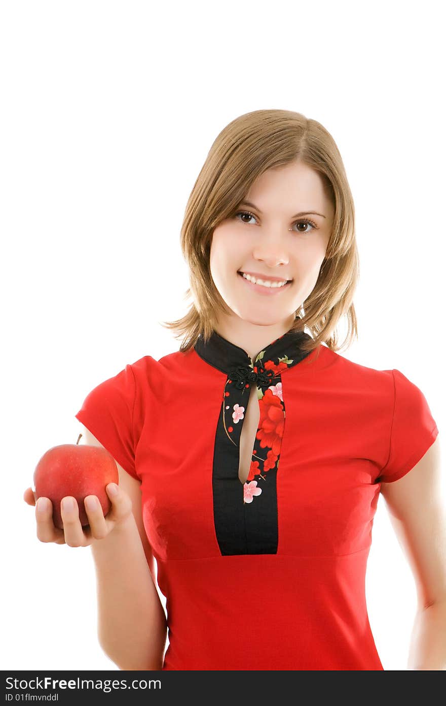 Smiling girl with a red apple. Isolated.