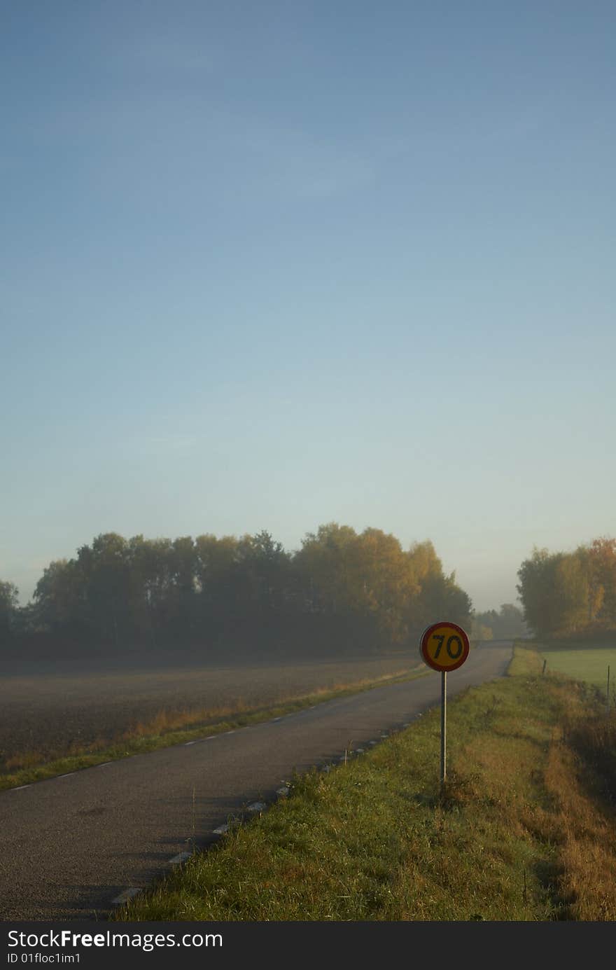 Road in a misty morning