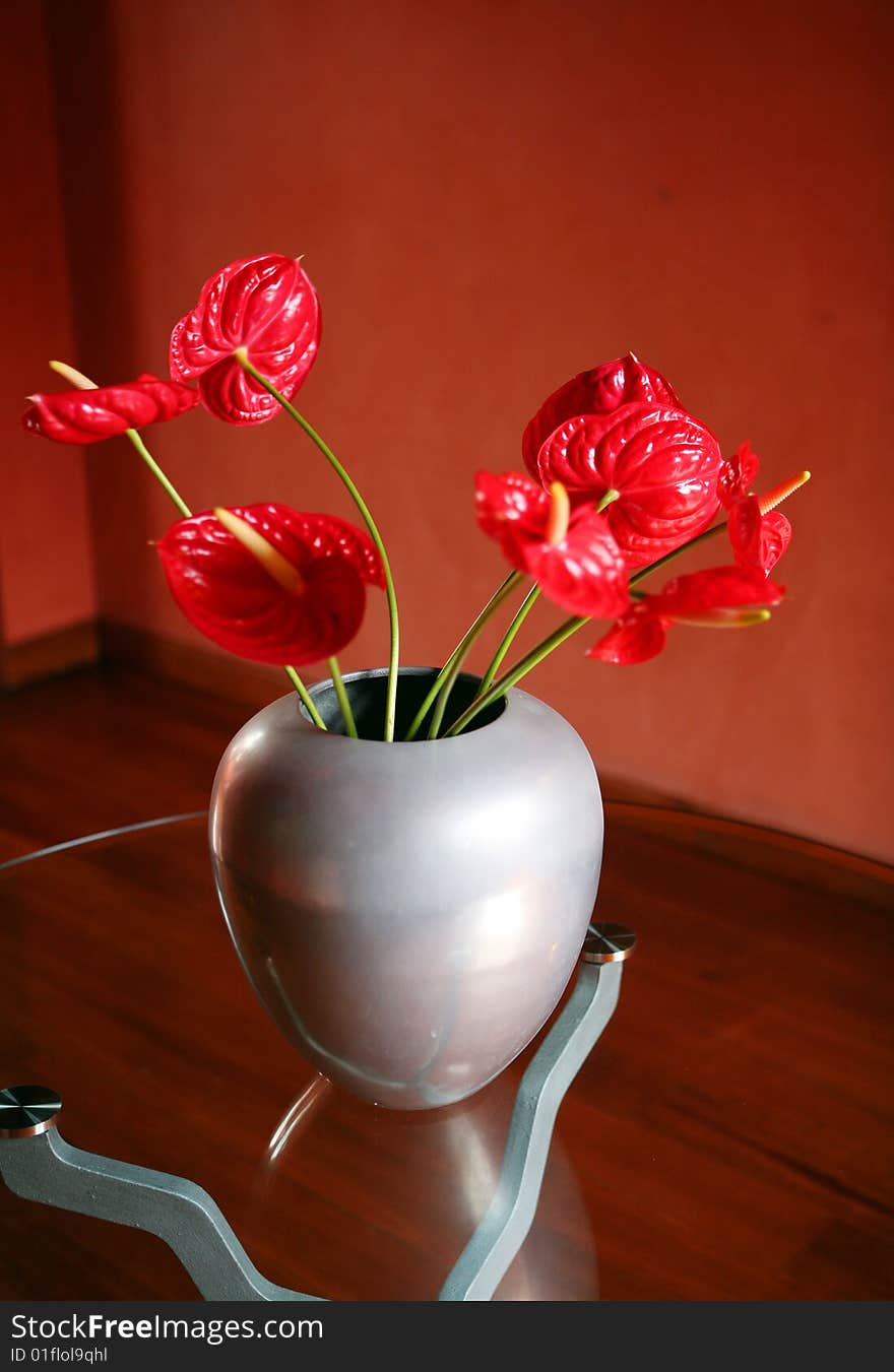 Red flowers isolated on the table