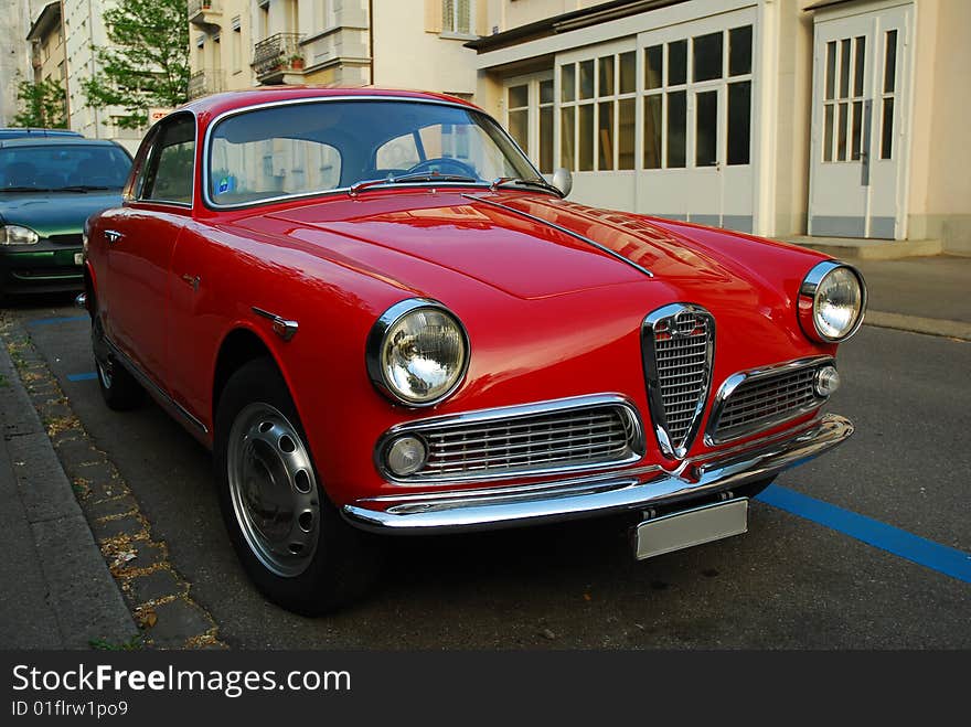 Red vintage car on the street in Zurich