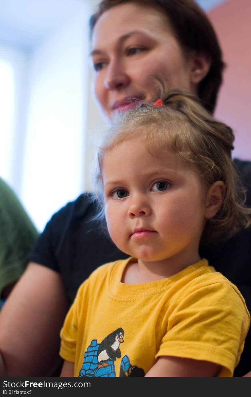 Beautiful little girl on mother's hands. Beautiful little girl on mother's hands