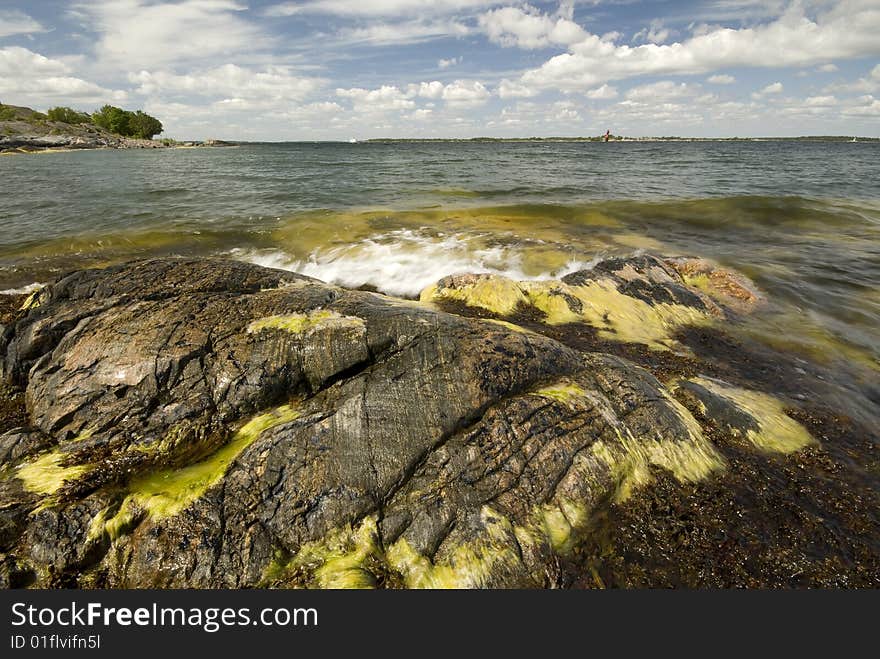 Waves coming in over the rocks in Stockholm