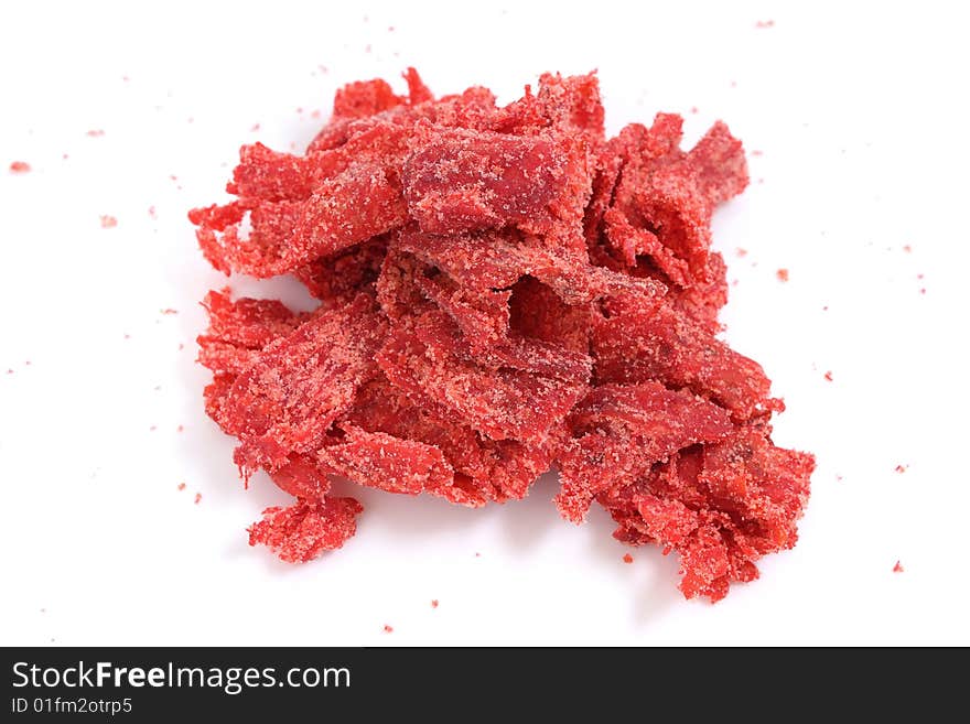 A pile of dried and baked cuttlefish on white background.