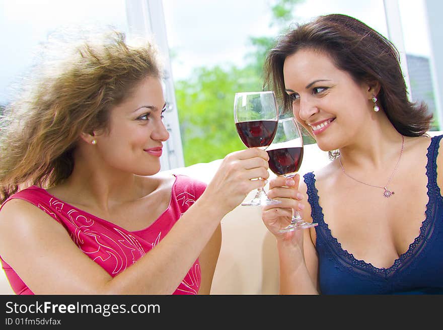 Portrait of two young attractive girls having good time. Portrait of two young attractive girls having good time