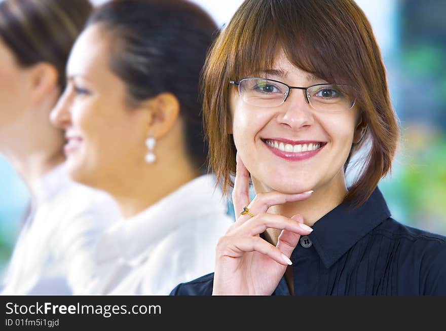 Portrait of young pretty woman in business environment. Portrait of young pretty woman in business environment