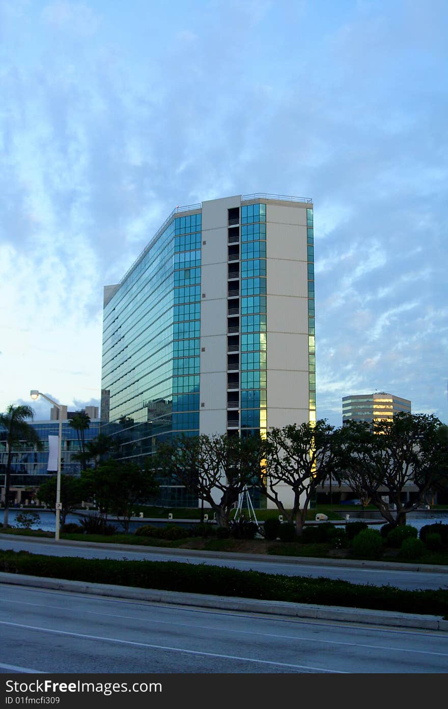 Office building against a blue morning sky