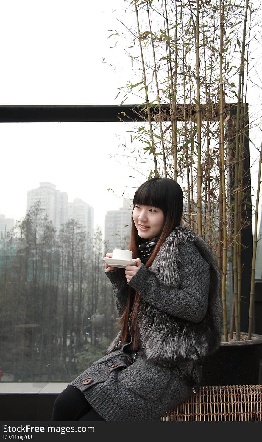 Beautiful asia woman with a cup of tea.