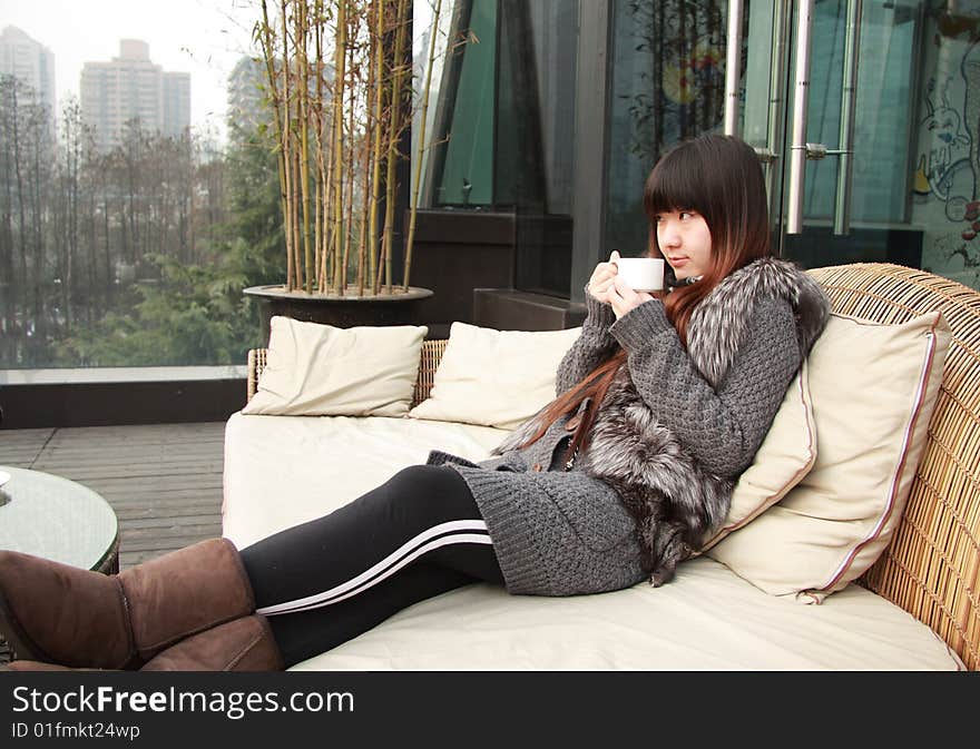 Beautiful asia woman with a cup of tea.