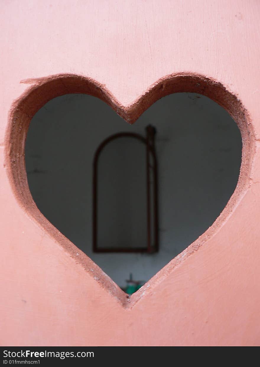 Pink heart on a door