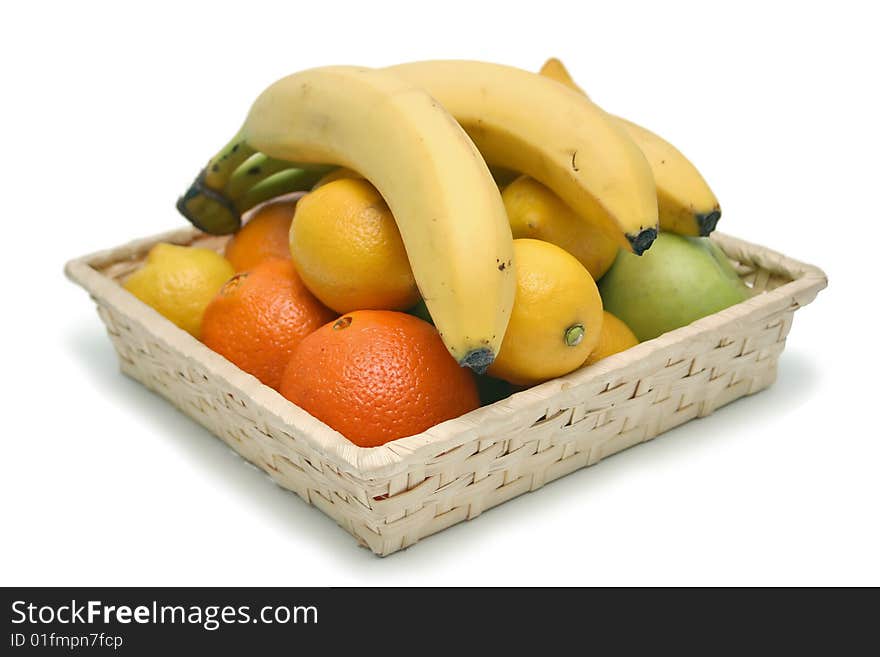 Isolated basket filled with fruits. Isolated basket filled with fruits