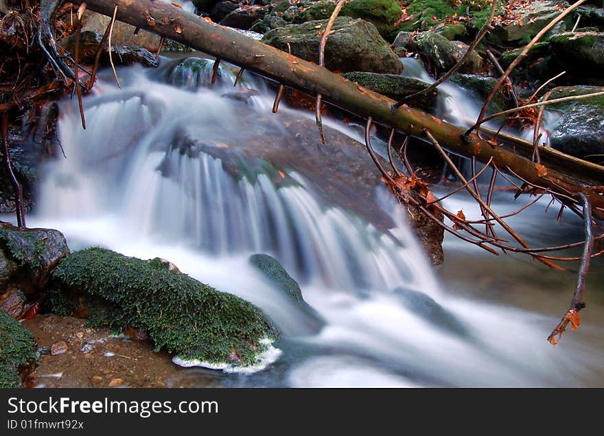 Mountain brook in the autumn landscape. Mountain brook in the autumn landscape