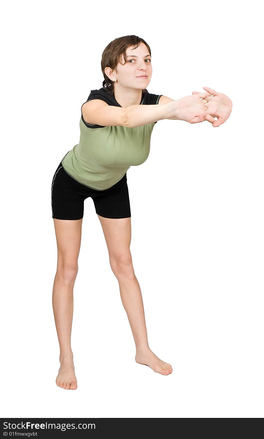 Young slim woman making fitness exercises isolated at the white background. Young slim woman making fitness exercises isolated at the white background