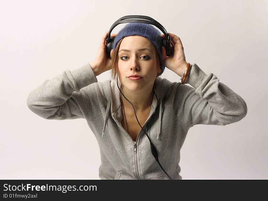 A beautiful girl with earphones. A beautiful girl with earphones