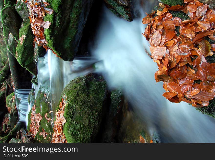 Mountain brook in the autumn landscape. Mountain brook in the autumn landscape