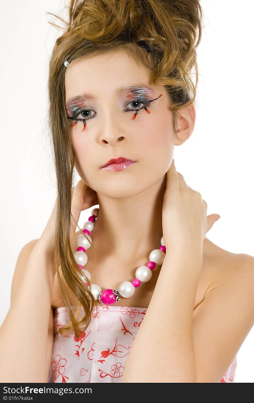 Closeup of young fashion girl with special eye makeup showing jewelry. Closeup of young fashion girl with special eye makeup showing jewelry