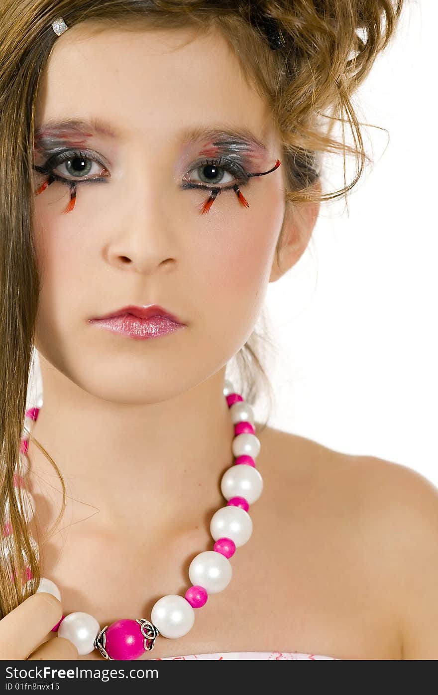 Closeup of young fashion girl with special eye makeup showing jewelry. Closeup of young fashion girl with special eye makeup showing jewelry