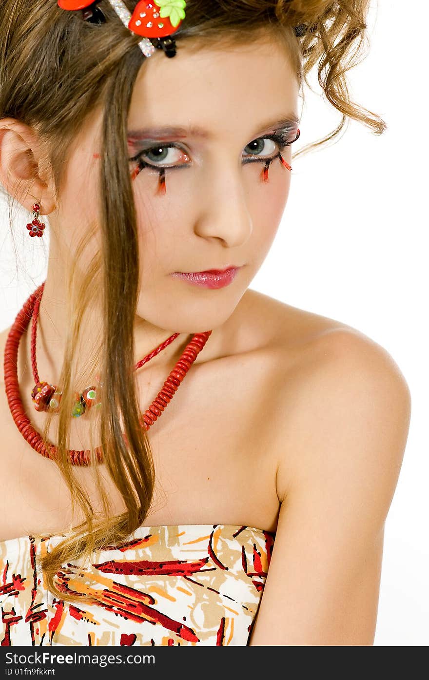 Closeup of young fashion girl with special eye makeup and red necklace. Closeup of young fashion girl with special eye makeup and red necklace