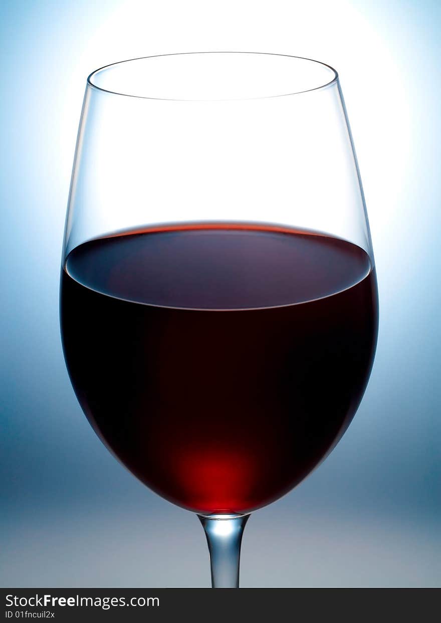 Glass filled with red wined with red wine