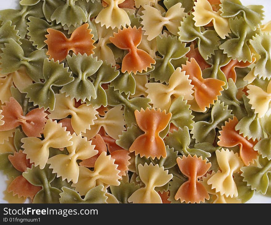 Large group of colorful macaroni isolated in studio