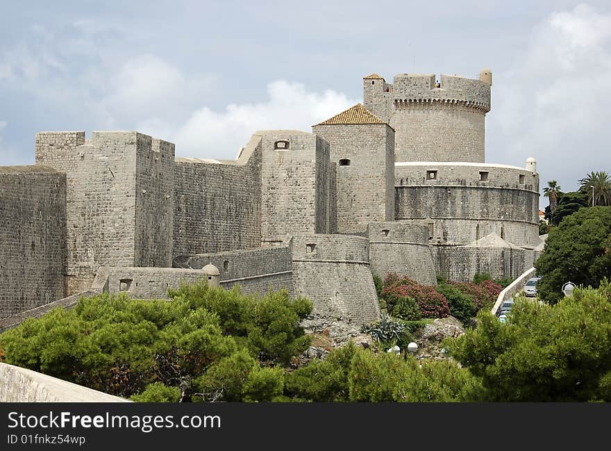 City walls and tower in Dubrovnik. City walls and tower in Dubrovnik