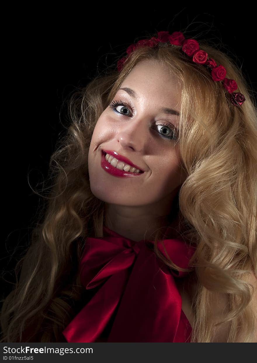 Beautiful teen lady in angel dress on black background. Beautiful teen lady in angel dress on black background