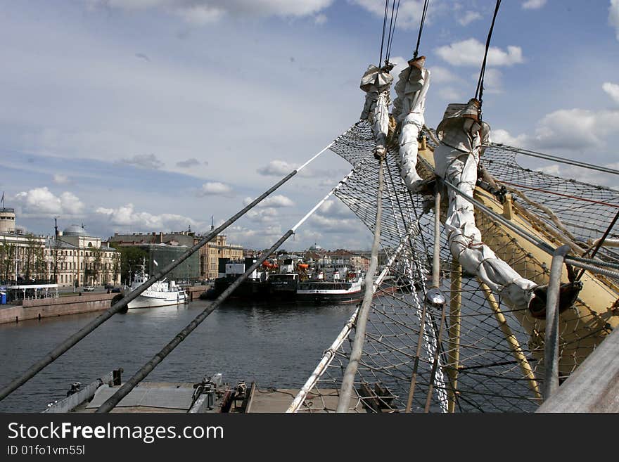 Convolute sails of sailship World at the embankment river Neva. Convolute sails of sailship World at the embankment river Neva