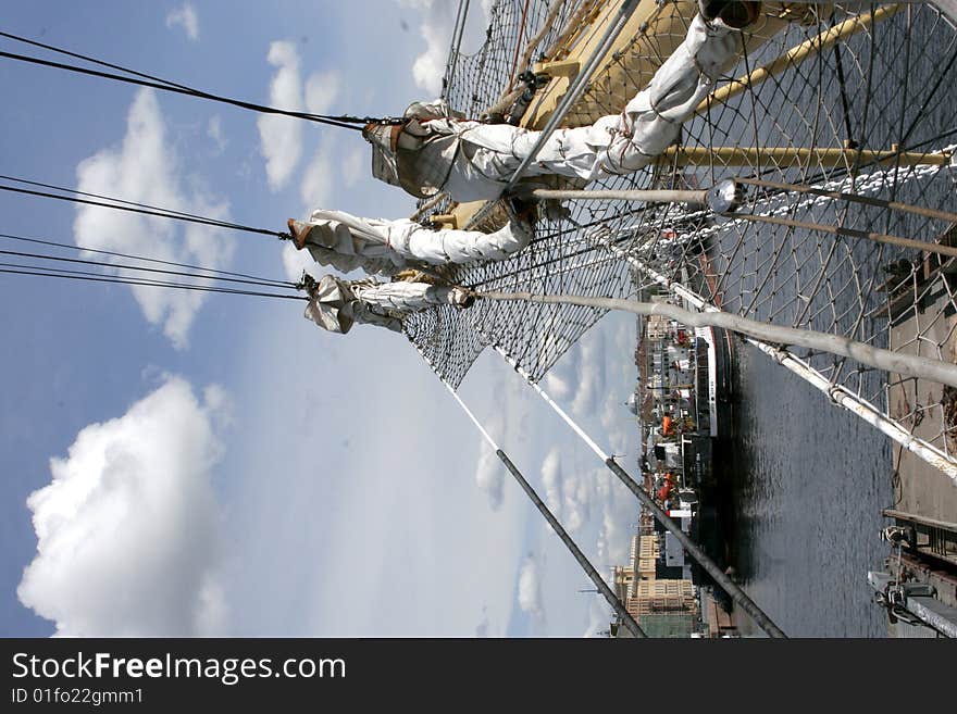 Convolute sails of sailship World at the embankment river Neva. Convolute sails of sailship World at the embankment river Neva