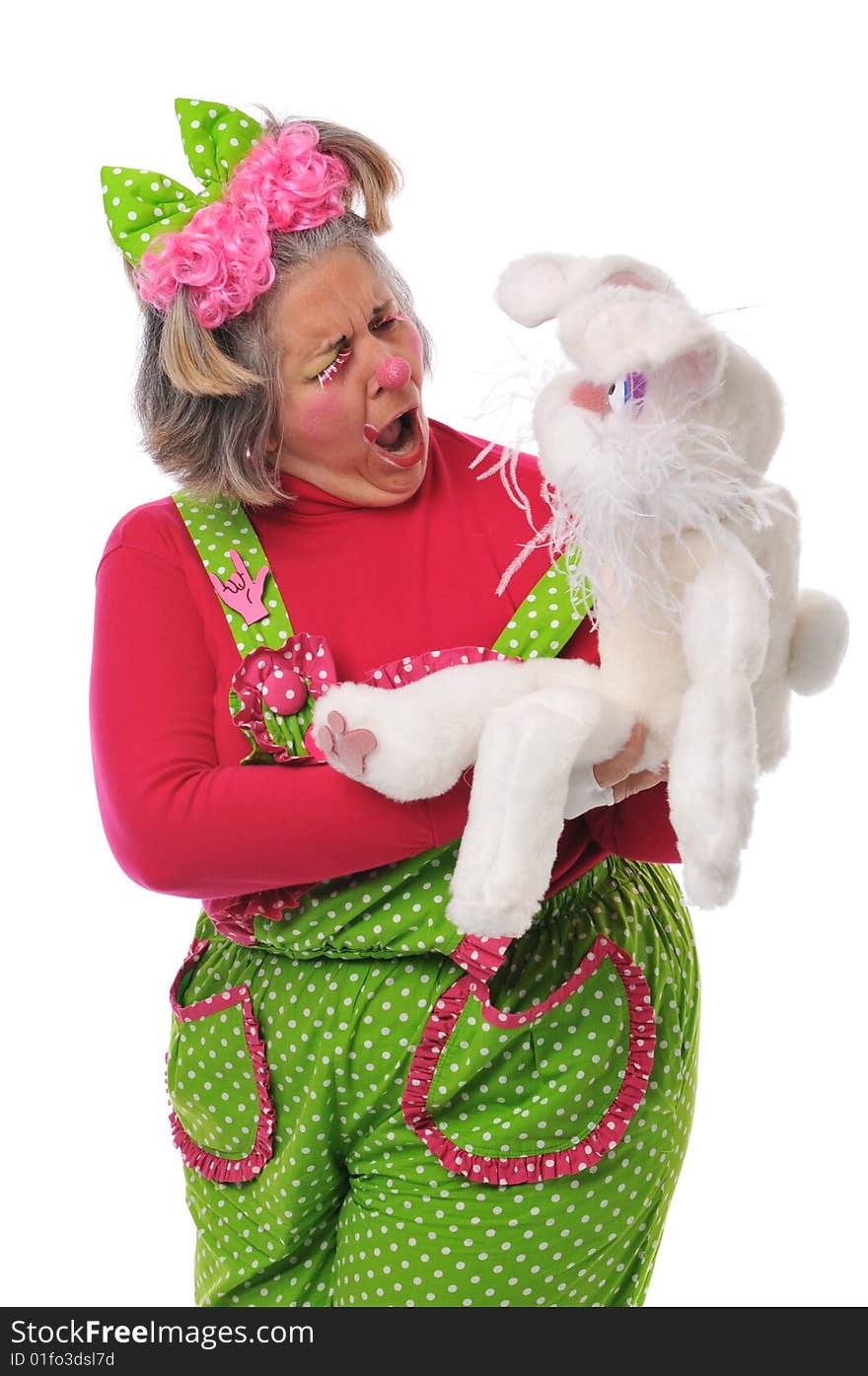 Clown with puppet isolated on a white background