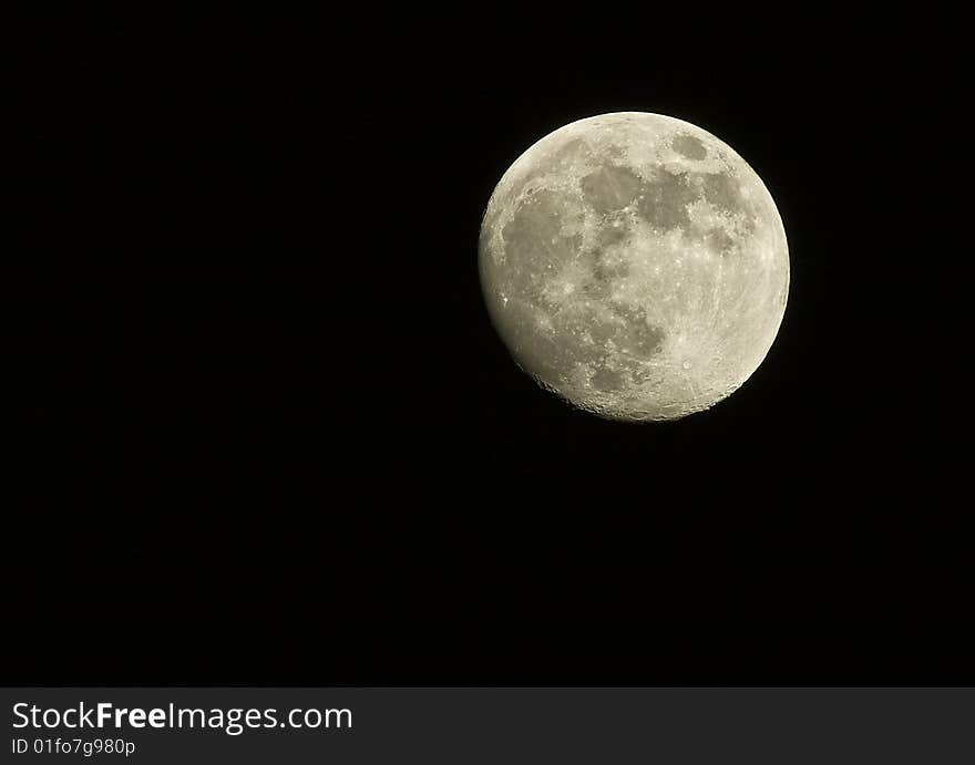 Full moon against dark black sky. Full moon against dark black sky