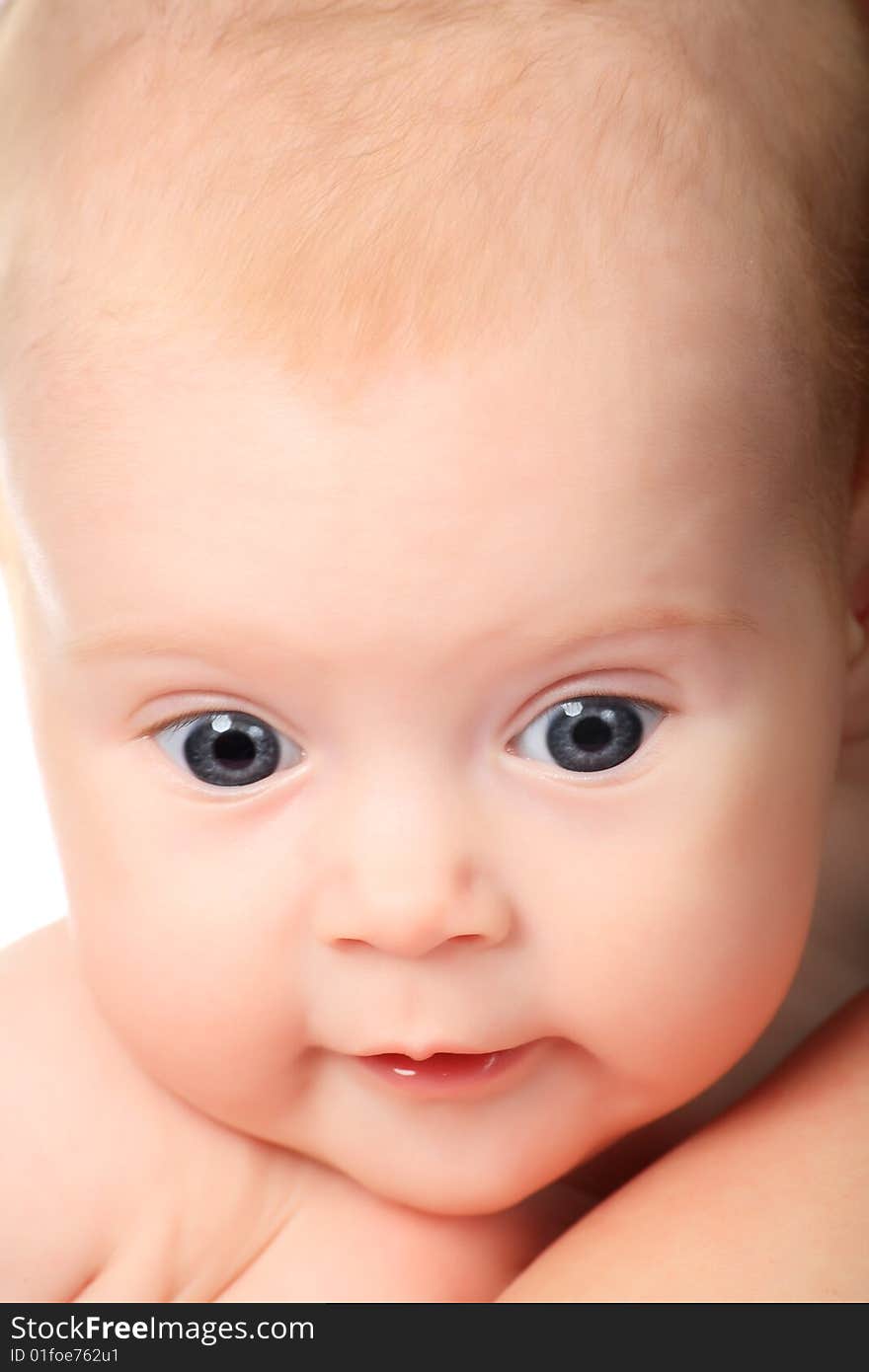 Beautiful baby. Shot in a studio. Isolated on white. Beautiful baby. Shot in a studio. Isolated on white.