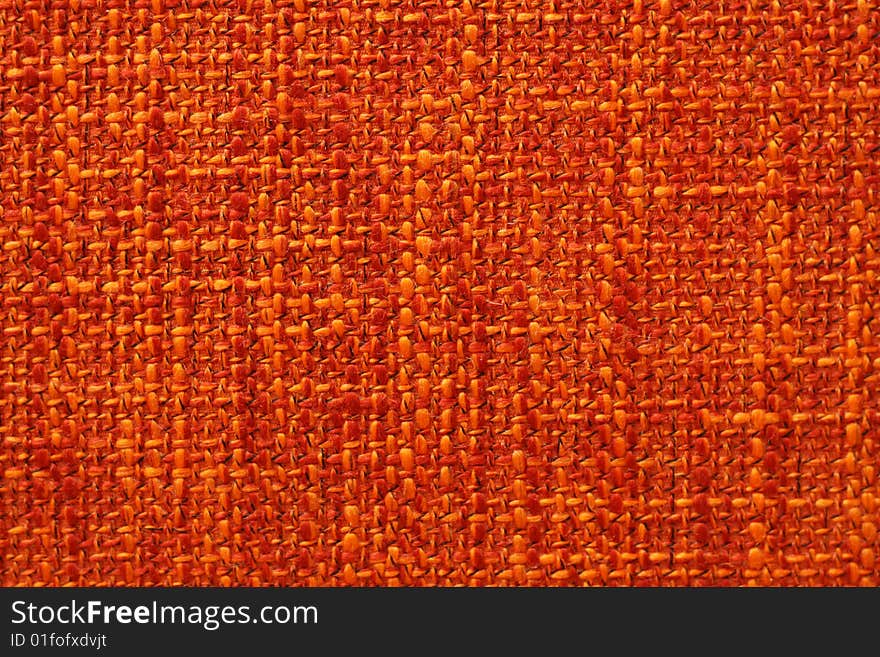 Close up orange fabric backround. Close up orange fabric backround