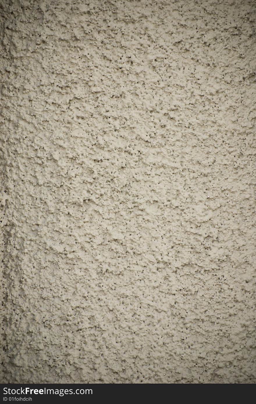 Close-up of stucco wall showing strong texture. Close-up of stucco wall showing strong texture