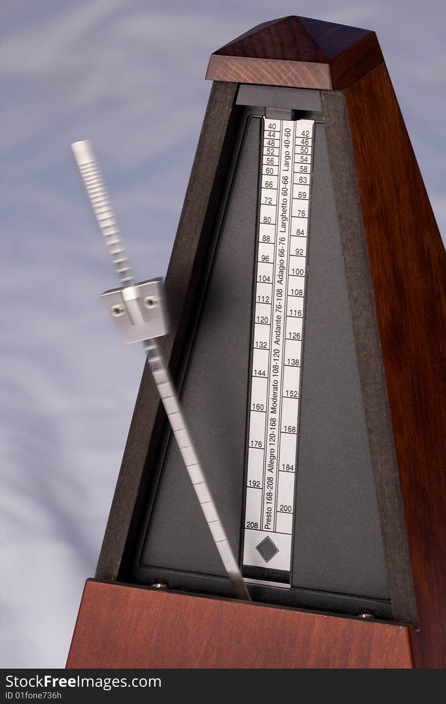 A closeup of a metronome