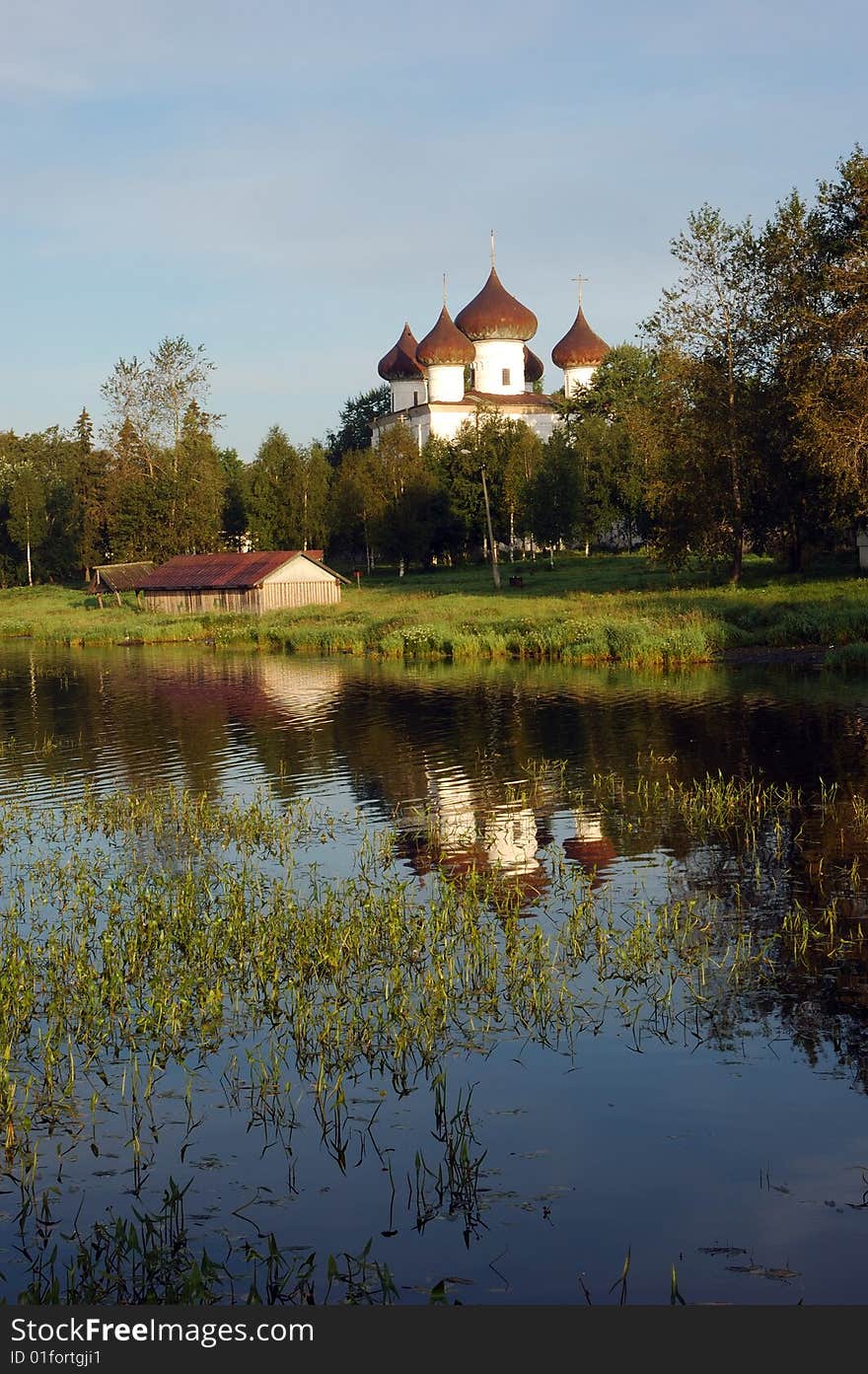 View of ancient cathedral in Kargopol at sunrise