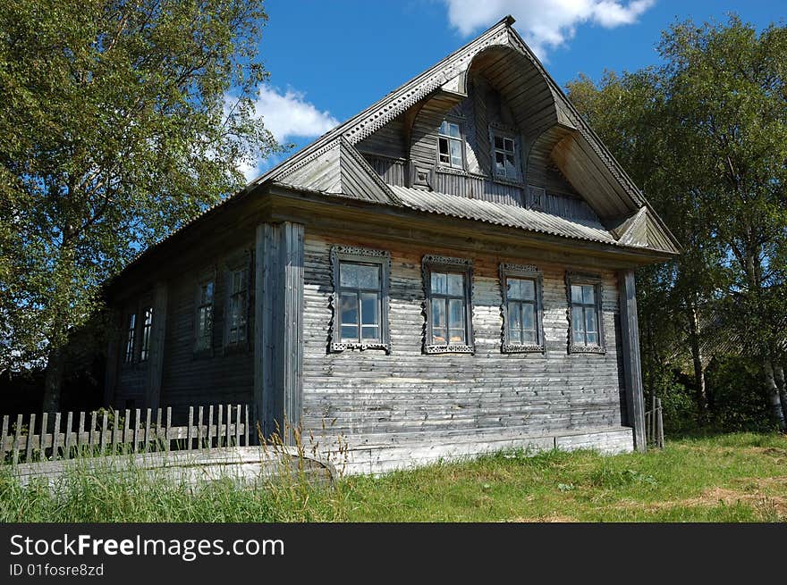 Old farmer's wooden house in northern russian village. Old farmer's wooden house in northern russian village