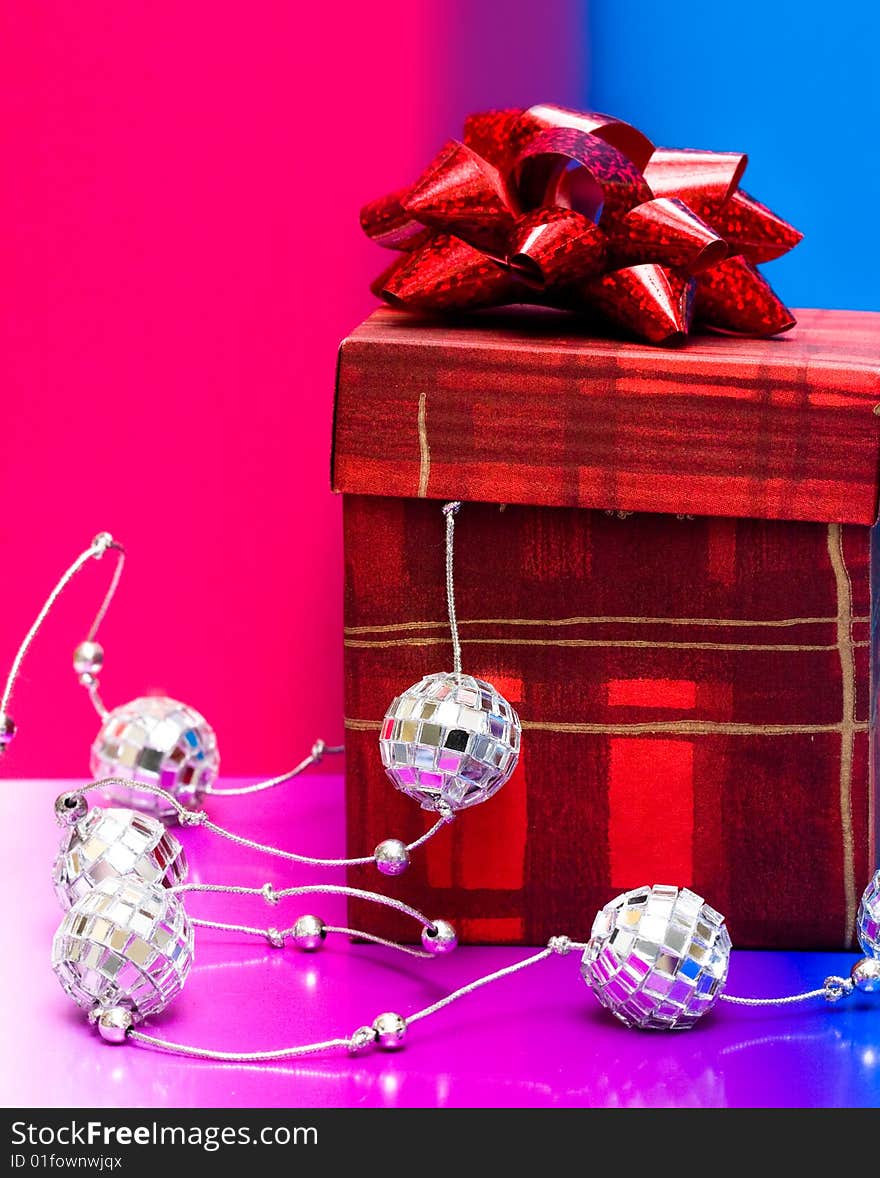 Red gift box with decoration balls