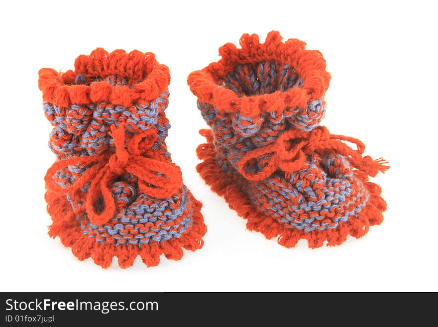 Crochet small children`s socks with fasten shoe-laces