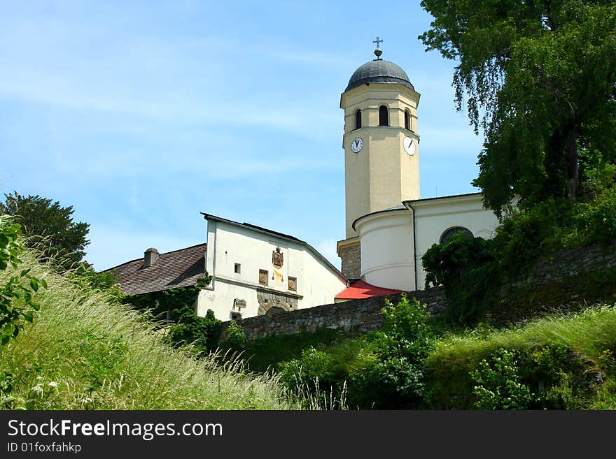 The steeple stands close to the castle Sovinec in the Czech Republic