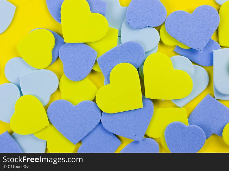 Hearts background in yellow and blue.