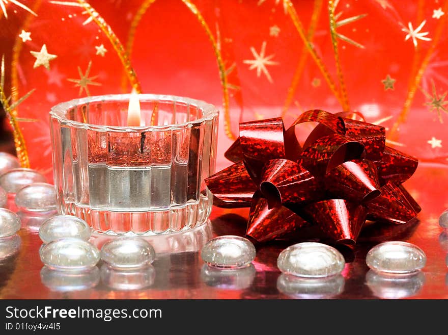 Festive candles with red bow