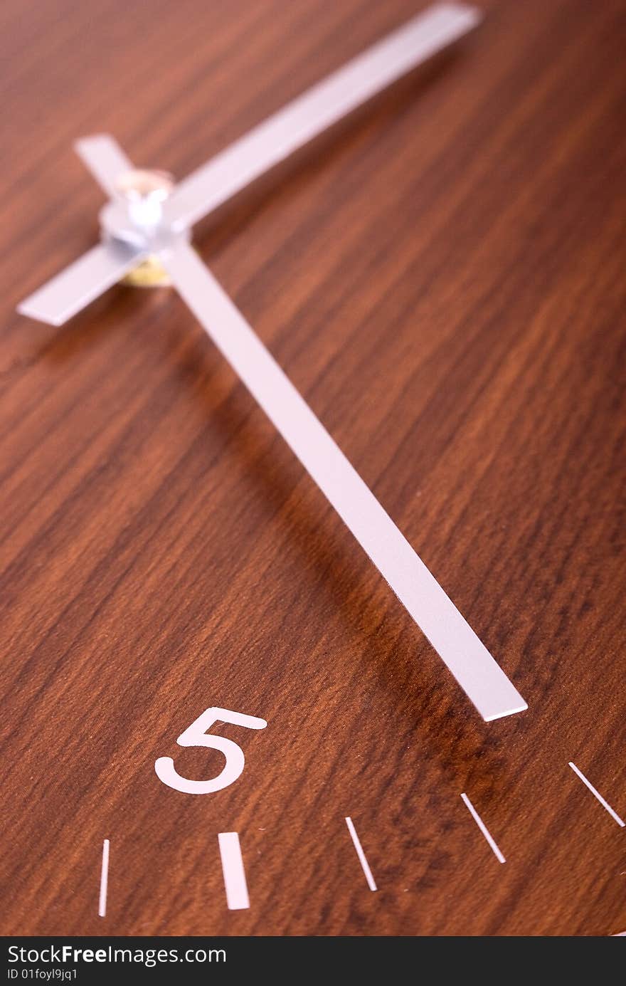 Close up clock with wooden background. Close up clock with wooden background