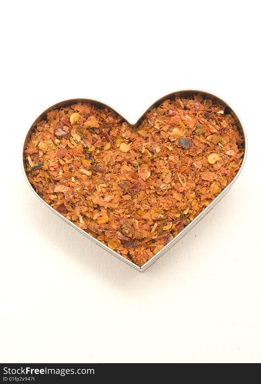 Crushed red pepper 	
isolated on a white background