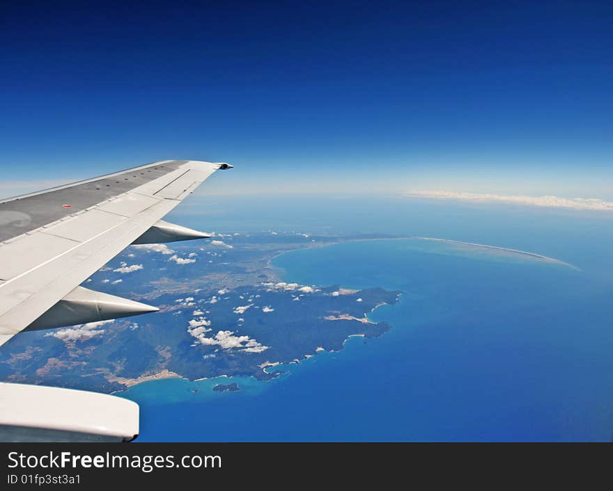 High altitude image with the wing of plane above Picton. High altitude image with the wing of plane above Picton