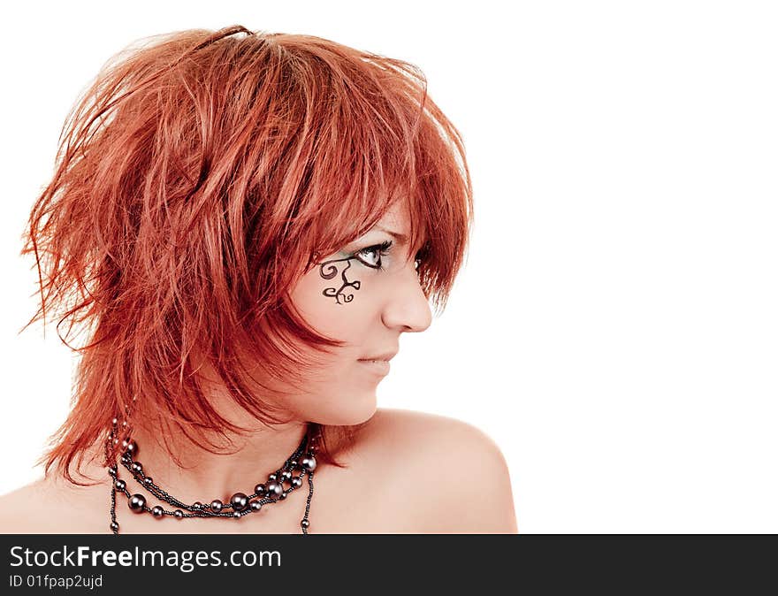 Young girl face profile with a tattoo on white background